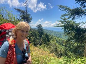 Pam Yarnell of Blount County, Tennessee, shown here hiking along the Appalachian Trail in the Smokies near Clingmans Dome. She has introduced many hikers to the Avent cabin and it holds a special place in her heart.