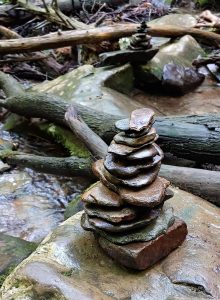 Rock cairns are neither Zen nor artistic sculpture, but instead a detriment to the aquatic environment. Photo by Sue Wasserman.