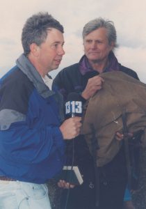WLOS-TV reporter Sherrill Barber interviews George Ellison atop Clingmans Dome in 1998. Ellison is holding Horace Kephart’s backpack while discussing Kephart’s role in the founding of GSMNP. Photo by Paul McGowan.