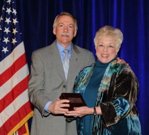 A park volunteer since 1969, Robin Goddard has been recognized for her service multiple times. In this photo from 2013, Goddard accepts the national George B. Hartzog Jr. Award for Enduring Service from Jonathan B. Jarvis, former Director of the National Park Service. Photo courtesy of GSMNP.