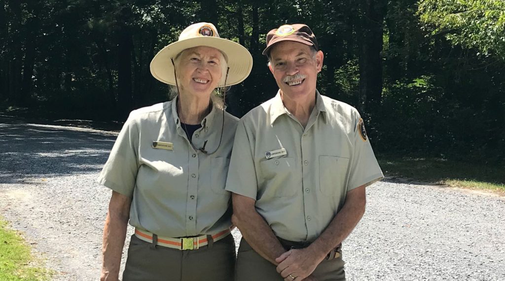 Nancy and Bob Furlow in their park camp host uniforms.