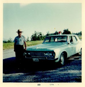 Park ranger Bill Acree poses with his patrol car in Great Smoky Mountains National Park in the early 1970s. Provided by Bill Acree.
